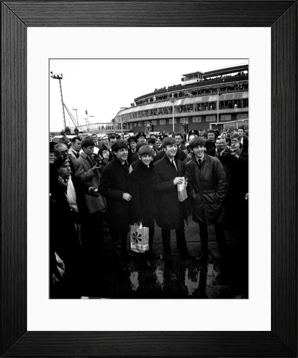 Framed Print : The Beatles arrive at London airport from Sweden. Surrounded by police, press and fans Framed Print : The Beatles arrive at London airport from Sweden. Surrounded by police, press and fans