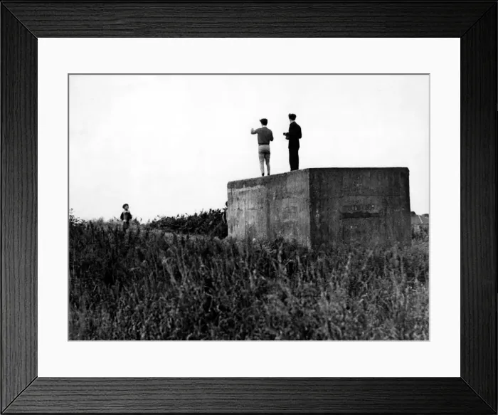 Framed Print : World War Two - Second World War - Children play on a WW2 gun emplacement / pillbox Framed Print : World War Two - Second World War - Children play on a WW2 gun emplacement / pillbox