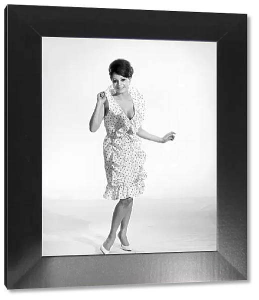Clothing: Fashion: Dress: Woman wearing Spanish dress. Model: Carmen Dane. 1964 B1750-002