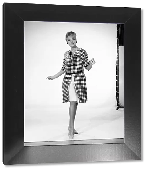 Clothing: Fashion: Marilyn Rickard wearing check panel dress. 1963 B2153-002