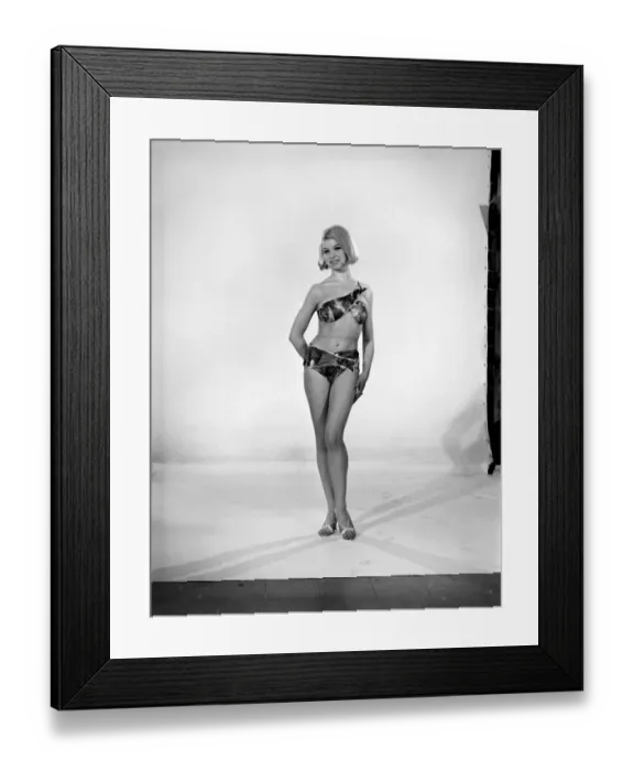 Framed Print : Clothing: Fashion: Beachwear: Woman wearing fish bikini. 1965 B1889a-001