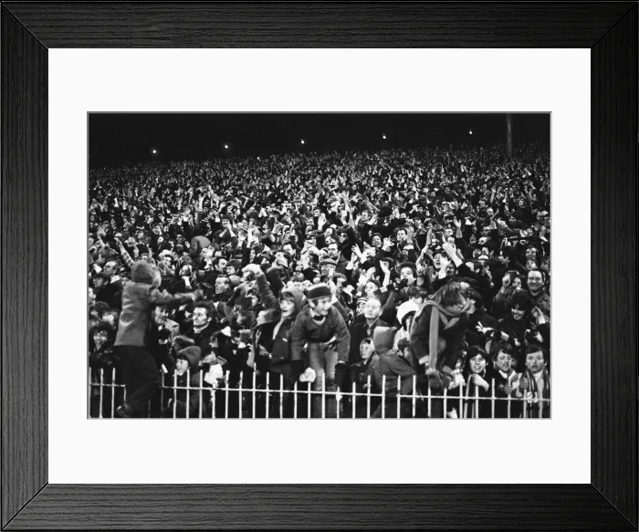Framed Print : Aston Villa fans celebrate after their teams two one victory over Manchester United in Framed Print : Aston Villa fans celebrate after their teams two one victory over Manchester United in
