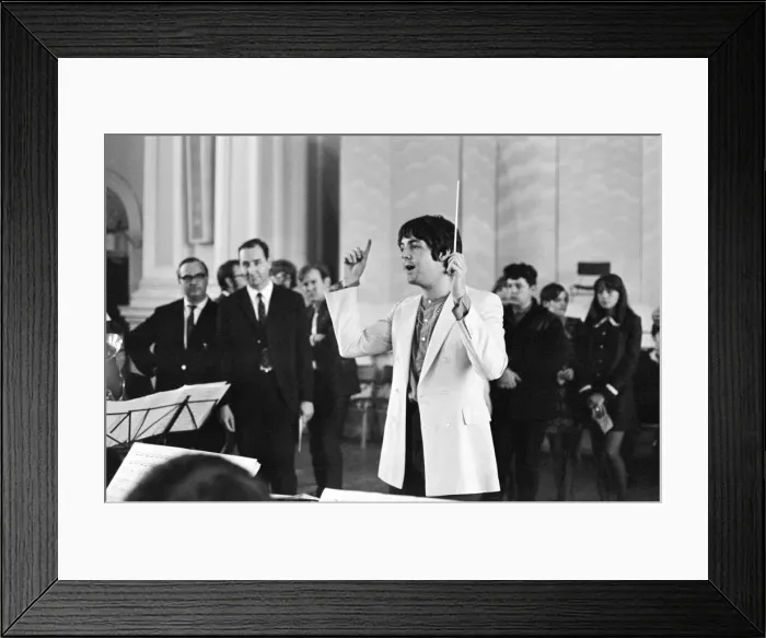 Framed Print : Paul McCartney of The Beatles, conducts the Black Dyke Mills Band, recording a record Framed Print : Paul McCartney of The Beatles, conducts the Black Dyke Mills Band, recording a record