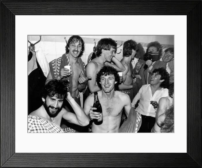 Framed Print : Champagne for the Villa players in the Arsenal dressing room after learning that they had Framed Print : Champagne for the Villa players in the Arsenal dressing room after learning that they had