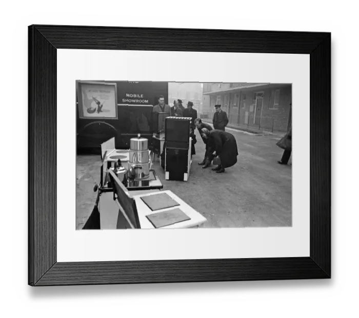 Framed Print : Door to Door Salesmen sell domestic appliances to homeowners in London Framed Print : Door to Door Salesmen sell domestic appliances to homeowners in London