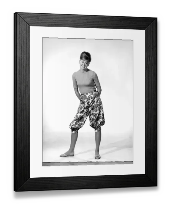 Framed Print : Clothing: Fashion: Trousers: Model wearing floral pattern pants. 1966