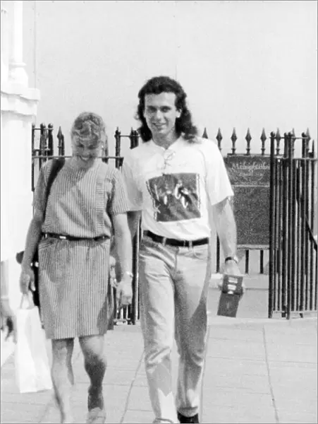 Jayne Torvill and her husband Phil Christensen walking down the road. 23rd September 1991