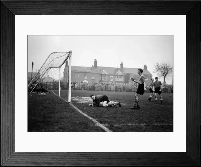 Framed Print : Torquay United footballer Sam Collins in action against Ely during their FA Cup tie Framed Print : Torquay United footballer Sam Collins in action against Ely during their FA Cup tie