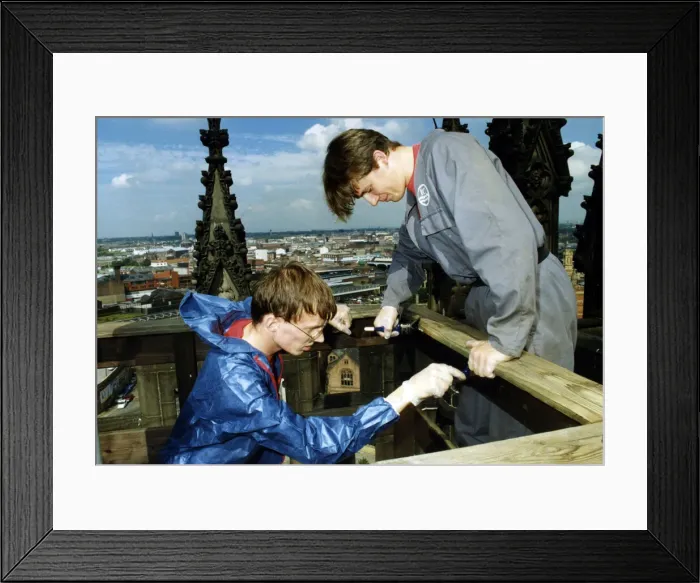 Framed Print : Chris Armstrong (left) and Carney Edwards strip and creosote the safety rails around Framed Print : Chris Armstrong (left) and Carney Edwards strip and creosote the safety rails around