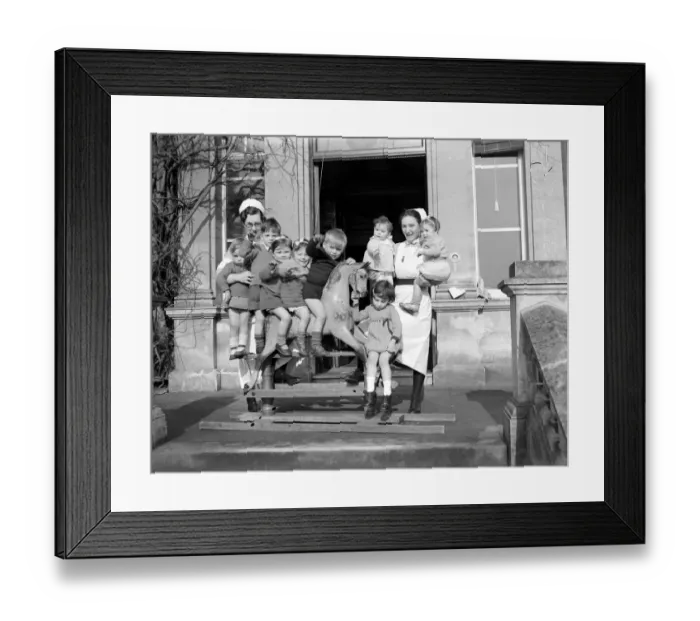 Framed Print : Children playing on a rocking horse at a day nursery in London circa 1945 Framed Print : Children playing on a rocking horse at a day nursery in London circa 1945