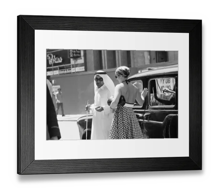 Framed Print : Arab man getting out from a taxi on Gloucester Road, South Kensington. June 1976 Framed Print : Arab man getting out from a taxi on Gloucester Road, South Kensington. June 1976