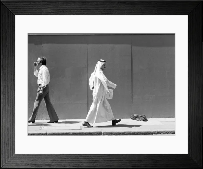 Framed Print : Arab man wearing traditional garments on Gloucester Road, South Kensington Framed Print : Arab man wearing traditional garments on Gloucester Road, South Kensington