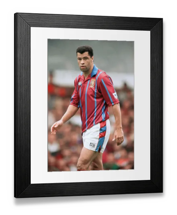 Framed Print : Aston Villa footballer Paul McGrath in action during their Premier league match against