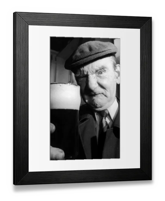 Framed Print : Disgruntled Robert McKinnon, 62, lifts a judges pint