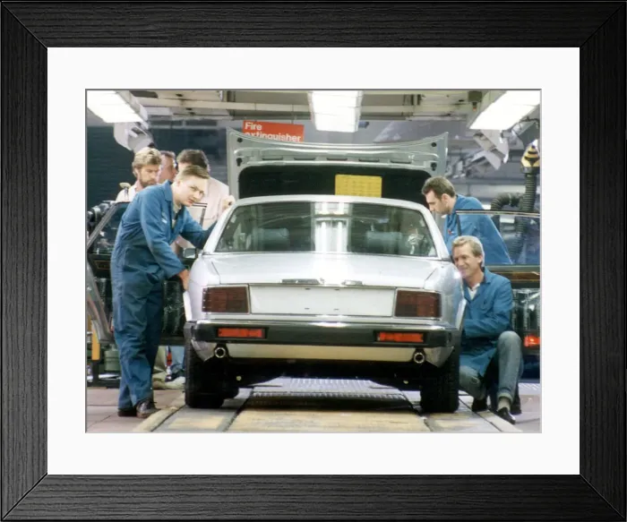 Framed Print : The last Jaguar XJ6 to be built on the old production line reaches the end of the track Framed Print : The last Jaguar XJ6 to be built on the old production line reaches the end of the track