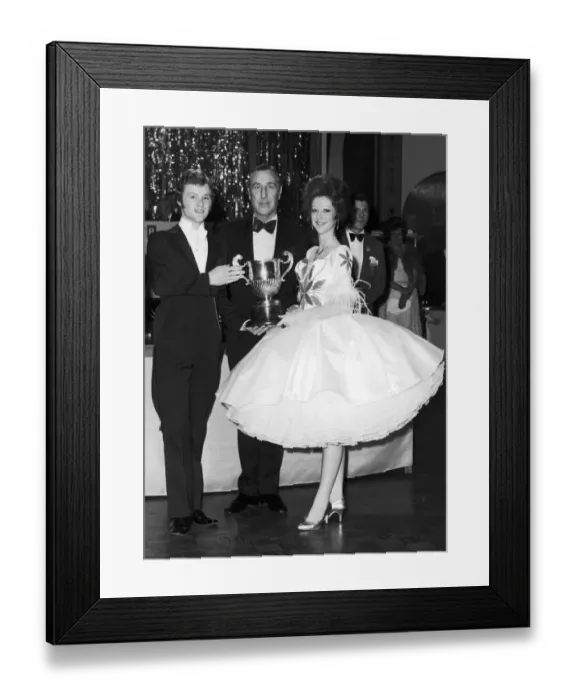 Framed Print : Anthony Latimer (left) and Verona Abbott both from Coventry seen here receiving Framed Print : Anthony Latimer (left) and Verona Abbott both from Coventry seen here receiving