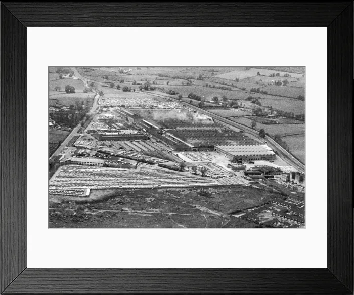 Framed Print : The Chrysler works at Ryton. The pattern of the factory roofs contrasts with that of