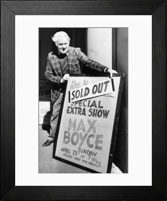 Framed Print : Theatre worker Ted Grant places the sign outside the Coventry Theatre telling the bad Framed Print : Theatre worker Ted Grant places the sign outside the Coventry Theatre telling the bad