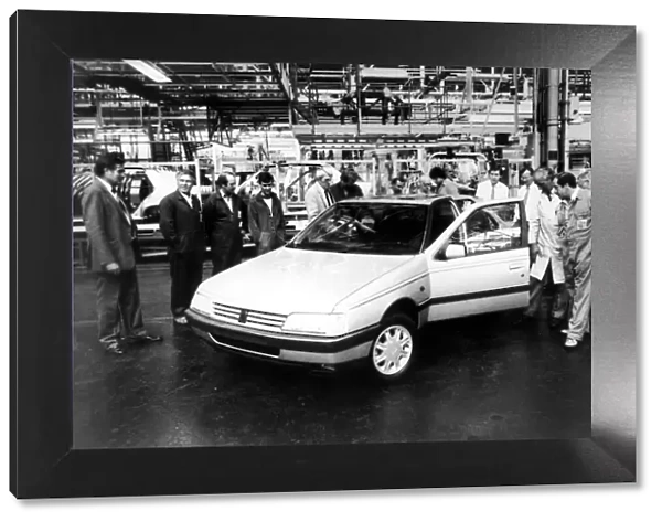 A new Peugeot rolls off the production line at the Peugeot factory at Ryton