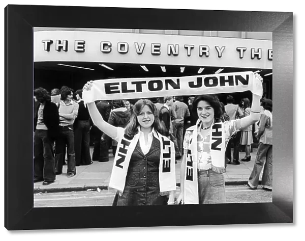 Elton John fans pose outside the Coventry Theatre before his concert 27th May 1976