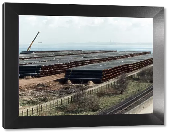 Stockpiles of steel tube at Leith Docks, Edinburgh, Scotland. 29th March 1990