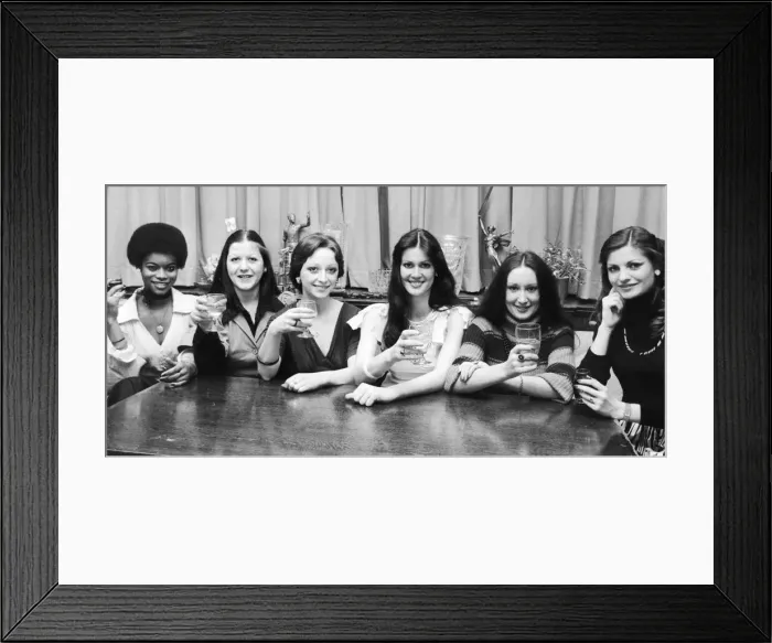 Framed Print : Cheers! A celebration drink for the six girls who won their way through to the finals of Framed Print : Cheers! A celebration drink for the six girls who won their way through to the finals of