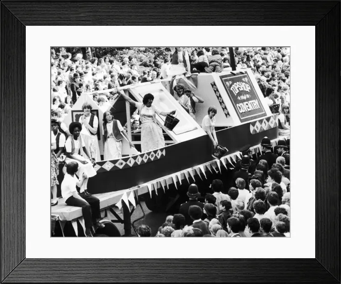Framed Print : The Top Shop float in the shape of a canal narrow boat seen here taking part in the 1981 Framed Print : The Top Shop float in the shape of a canal narrow boat seen here taking part in the 1981