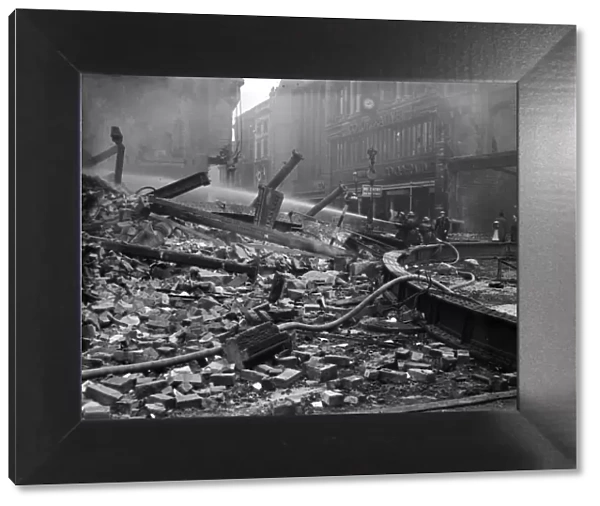 Bomb damage to High Street in Birmingham, after air raid on night of 9th April 1941