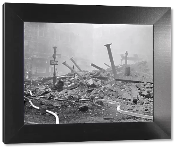 Bomb damage to Bull Ring, High Street, Birmingham, after air raid on night of 9th April