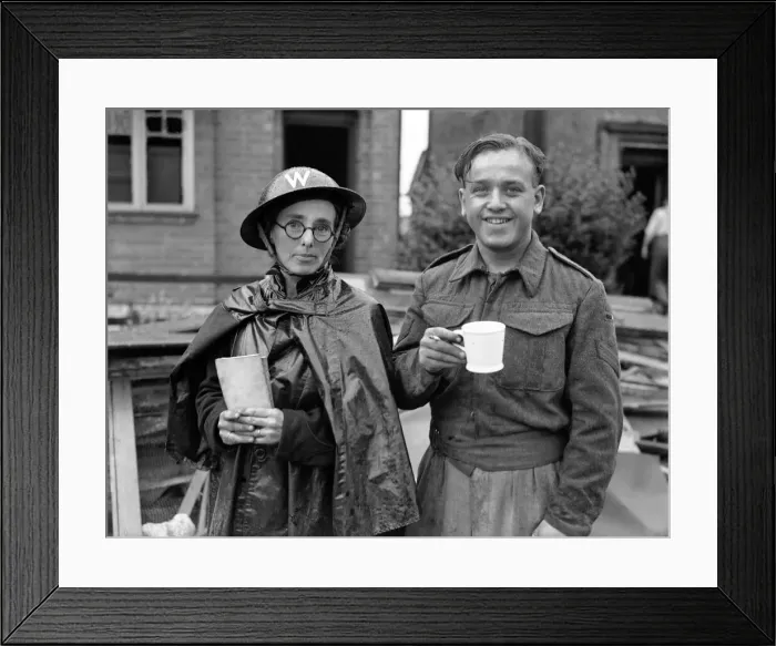 Framed Print : Military Personal take a break from inspecting Bomb damage after Air Raid, Solihull Framed Print : Military Personal take a break from inspecting Bomb damage after Air Raid, Solihull