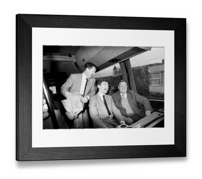 Framed Print : Former Liverpool manager Bob Paisley (right) shares a joke with Manchester United manager