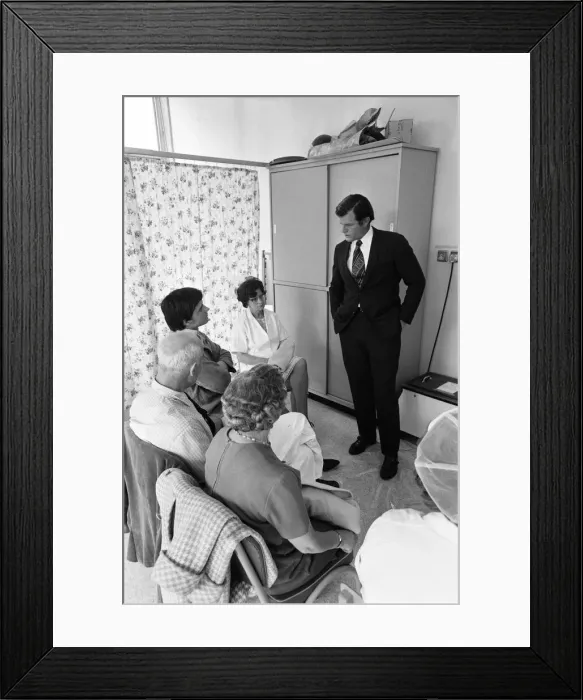 Framed Print : Senator Edward Kennedy seen here chatting to the patients at the medical centre during Framed Print : Senator Edward Kennedy seen here chatting to the patients at the medical centre during