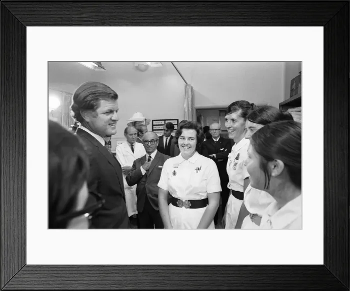 Framed Print : Senator Edward Kennedy seen here speaking to Sister Maureen Rouse (centre