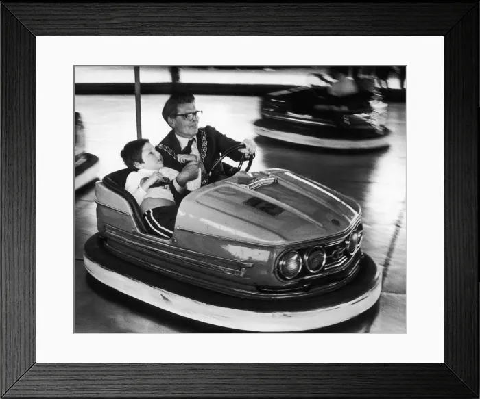 Framed Print : Councillor Weaver chauffeurs Timmy Atkinson, aged 10, from Wisteria Lodge on the dodgems Framed Print : Councillor Weaver chauffeurs Timmy Atkinson, aged 10, from Wisteria Lodge on the dodgems