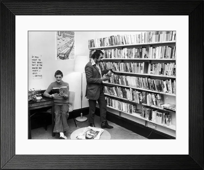 Framed Print : Scenes inside Norton House showing people reading books in the library Framed Print : Scenes inside Norton House showing people reading books in the library