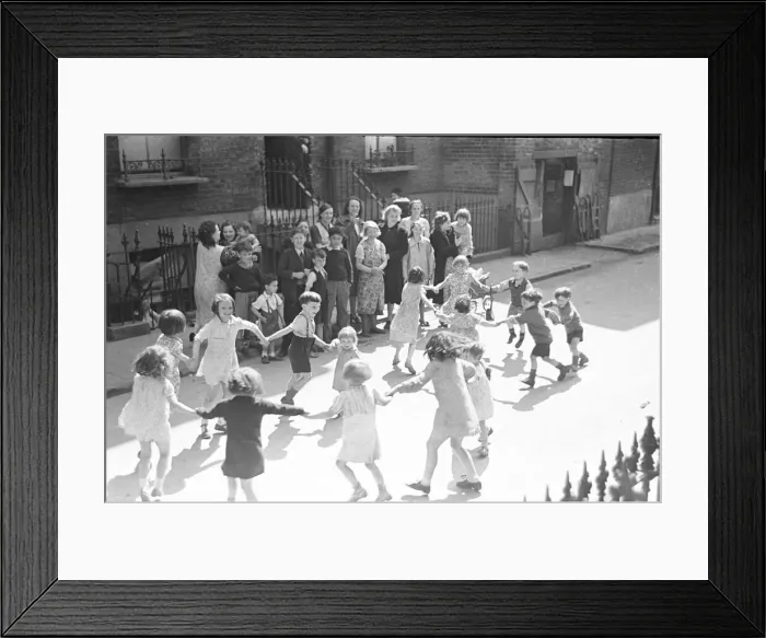Framed Print : London Kids, children seen here playing in the street during the spring of 1941 Circa May