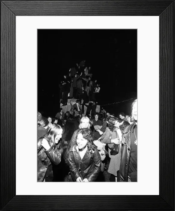 Framed Print : A happy crowd of young people greet the New Year in high-spirits in Broadgate, Coventry Framed Print : A happy crowd of young people greet the New Year in high-spirits in Broadgate, Coventry