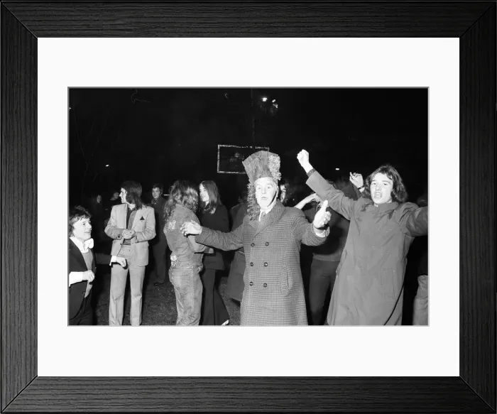 Framed Print : A happy crowd of young people greet the New Year in high-spirits in Broadgate, Coventry Framed Print : A happy crowd of young people greet the New Year in high-spirits in Broadgate, Coventry