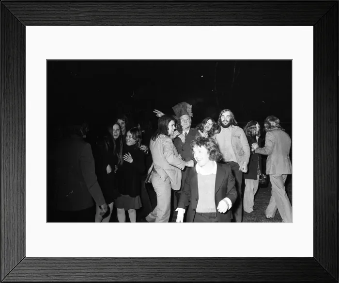 Framed Print : A happy crowd of young people greet the New Year in high-spirits in Broadgate, Coventry Framed Print : A happy crowd of young people greet the New Year in high-spirits in Broadgate, Coventry