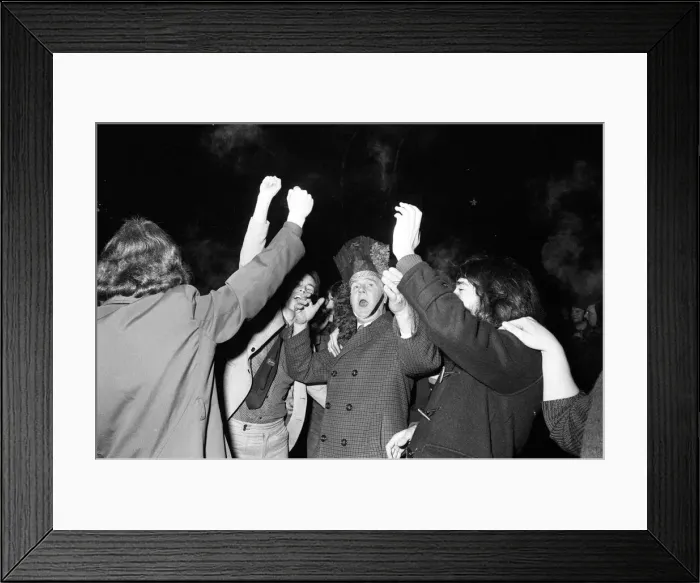 Framed Print : A happy crowd of young people greet the New Year in high-spirits in Broadgate, Coventry Framed Print : A happy crowd of young people greet the New Year in high-spirits in Broadgate, Coventry