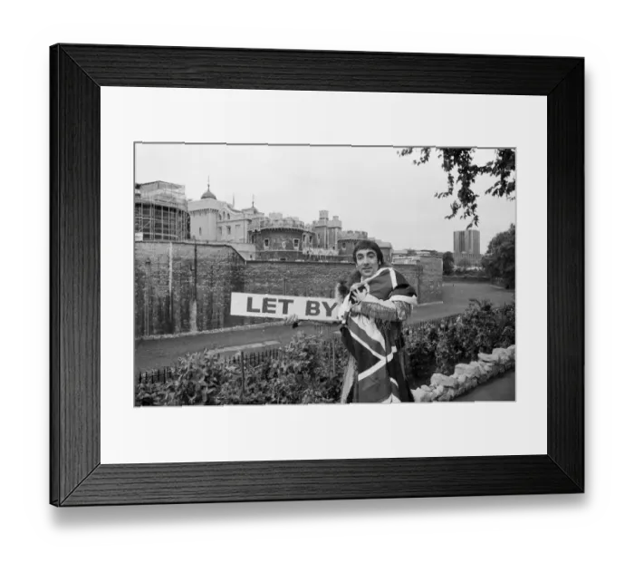 Framed Print : Keith Moon, drummer with British rock group The Who, draped in the Union Jack flag Framed Print : Keith Moon, drummer with British rock group The Who, draped in the Union Jack flag