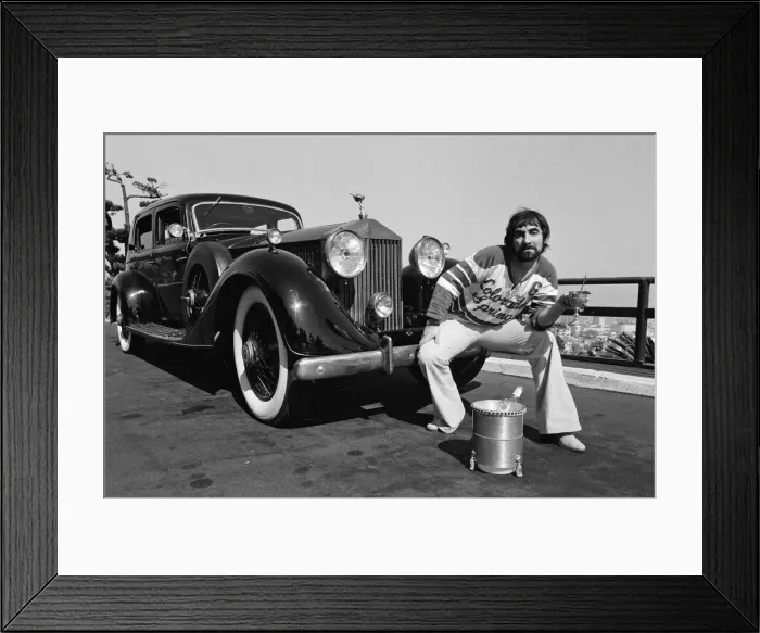 Framed Print : Keith Moon, drummer of The Who rock group, with his 1929 built Rolls Royce car in
