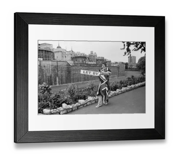 Framed Print : Keith Moon, drummer with British rock group The Who, draped in the Union Jack flag