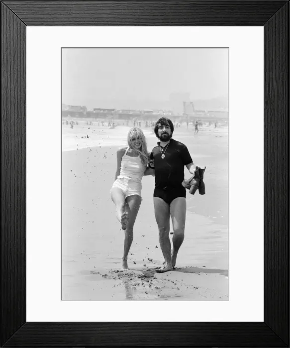Framed Print : Keith Moon, drummer of The Who rock group with model Annette Lax in the resort of Malibu Framed Print : Keith Moon, drummer of The Who rock group with model Annette Lax in the resort of Malibu