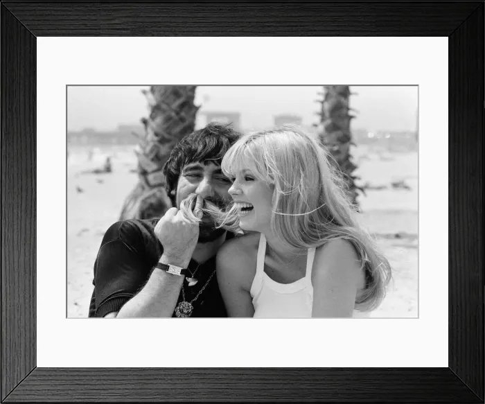 Framed Print : Keith Moon, drummer of The Who rock group with model Annette Lax in the resort of Malibu Framed Print : Keith Moon, drummer of The Who rock group with model Annette Lax in the resort of Malibu