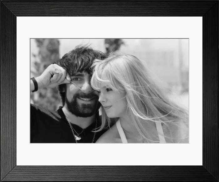 Framed Print : Keith Moon, drummer of The Who rock group with model Annette Lax in the resort of Malibu