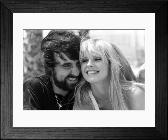 Framed Print : Keith Moon, drummer of The Who rock group with model Annette Lax in the resort of Malibu