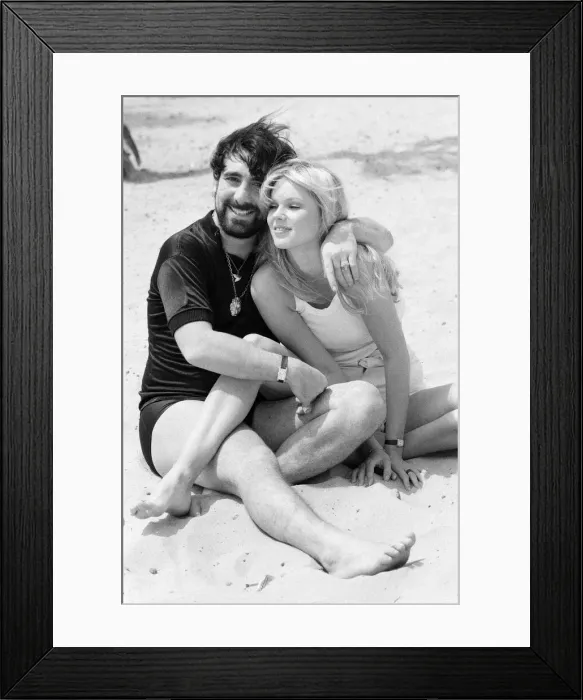Framed Print : Keith Moon, drummer of The Who rock group with model Annette Lax in the resort of Malibu Framed Print : Keith Moon, drummer of The Who rock group with model Annette Lax in the resort of Malibu