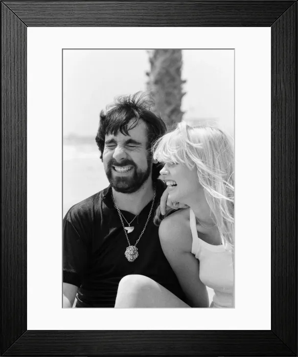 Framed Print : Keith Moon, drummer of The Who rock group with model Annette Lax in the resort of Malibu Framed Print : Keith Moon, drummer of The Who rock group with model Annette Lax in the resort of Malibu