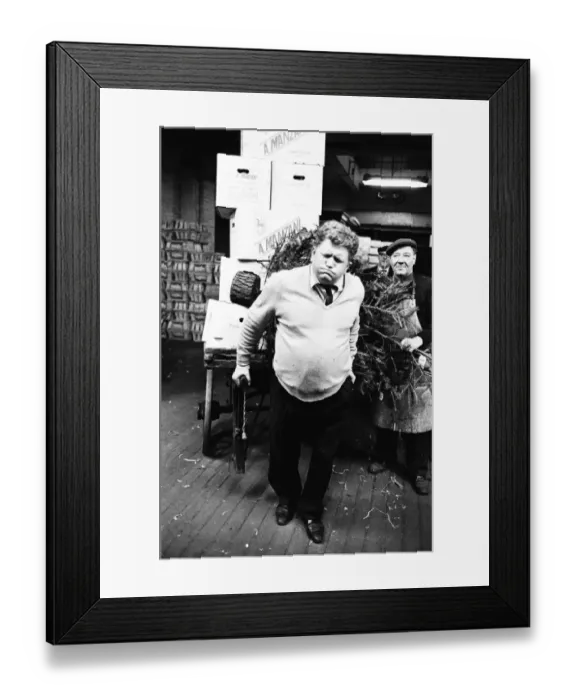 Framed Print : Covent Garden Market Porter pulling a barrow. Covent Garden Market, London, England Framed Print : Covent Garden Market Porter pulling a barrow. Covent Garden Market, London, England